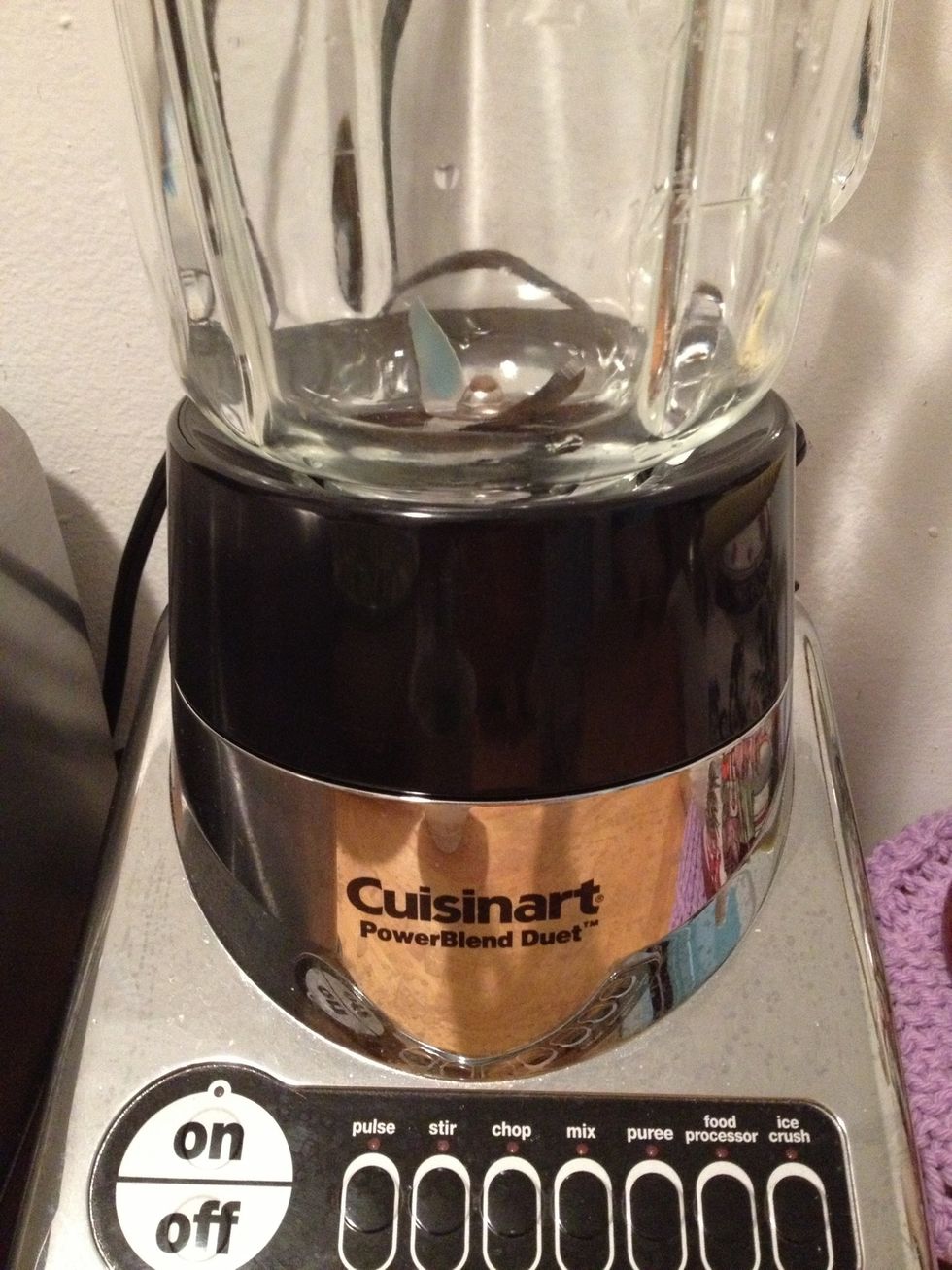 Add all ingredients except olive oil to blender. Puree the ingredients until well blended.