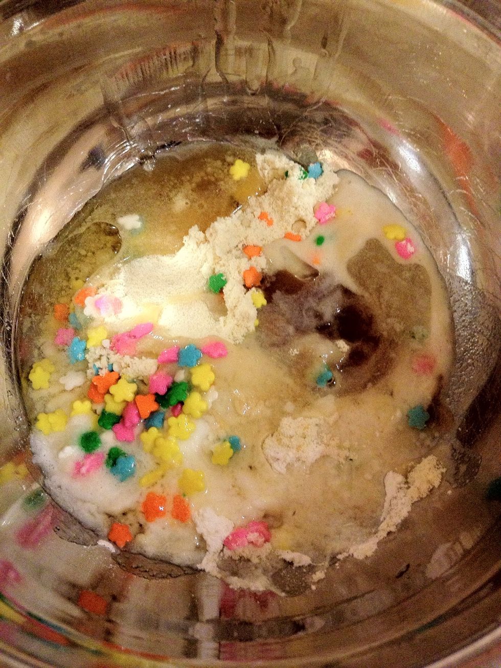 Add all of the ingredients except the coconut oil to a small mixing bowl.