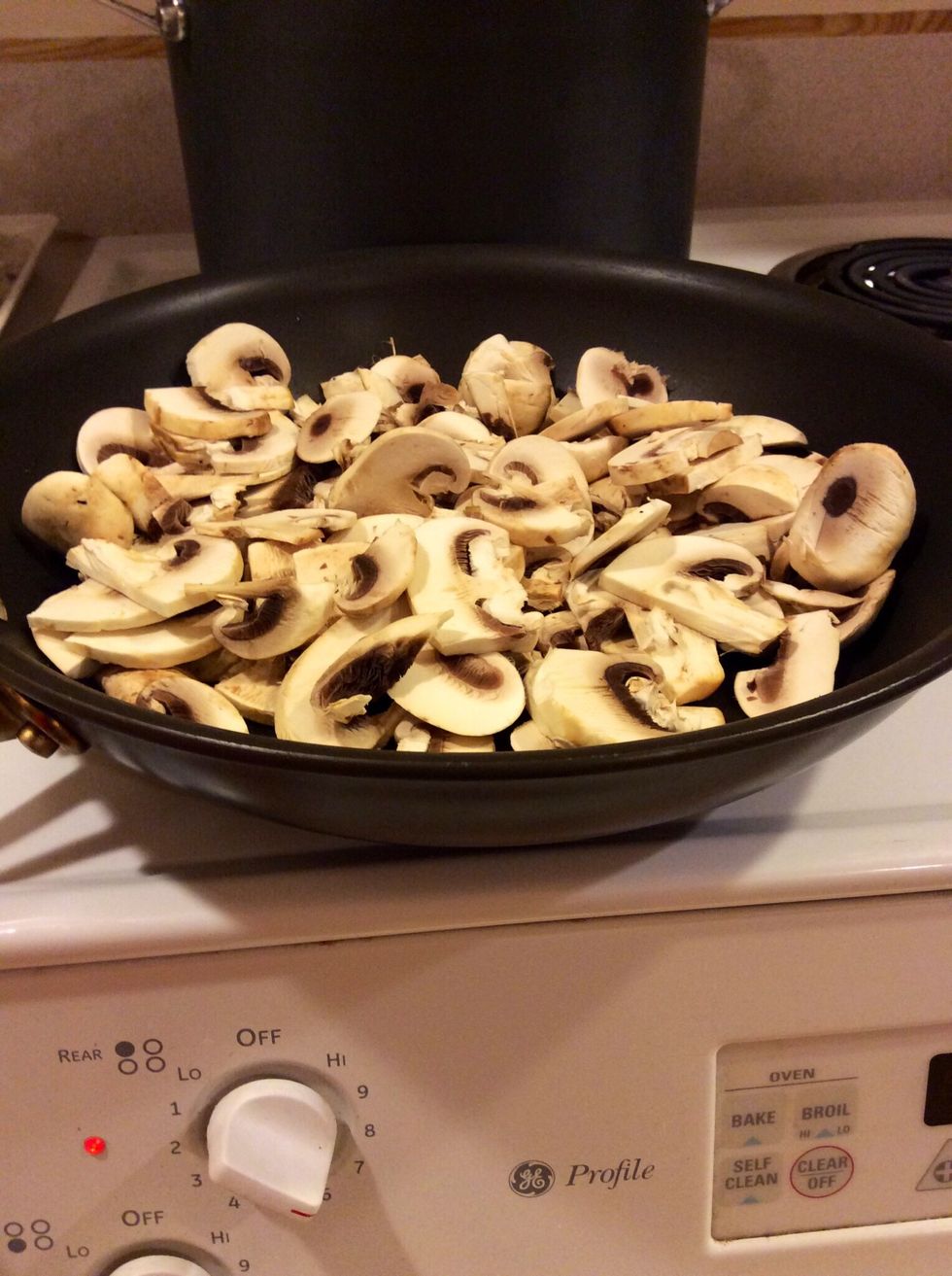 Add all of the mushrooms at one time. Stir only once then resist the urge to stir! Mushrooms will brown nicely if you don't stir. If you feel like stirring put your hands up and do a dance!