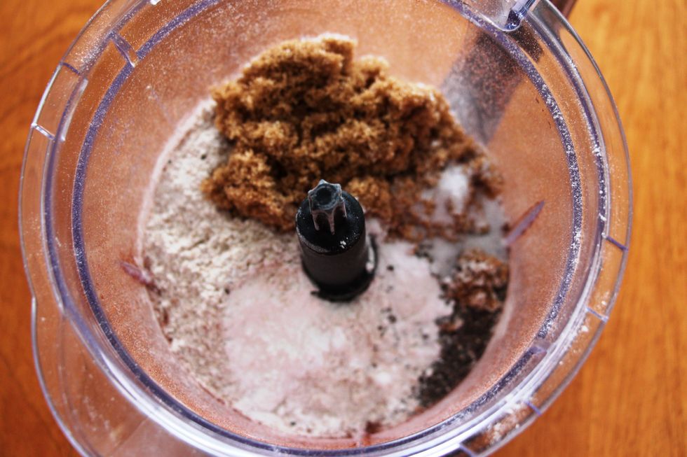 Add all of the other dry ingredients except for the icing sugar into a food processor. That icing sugar is for the glaze.