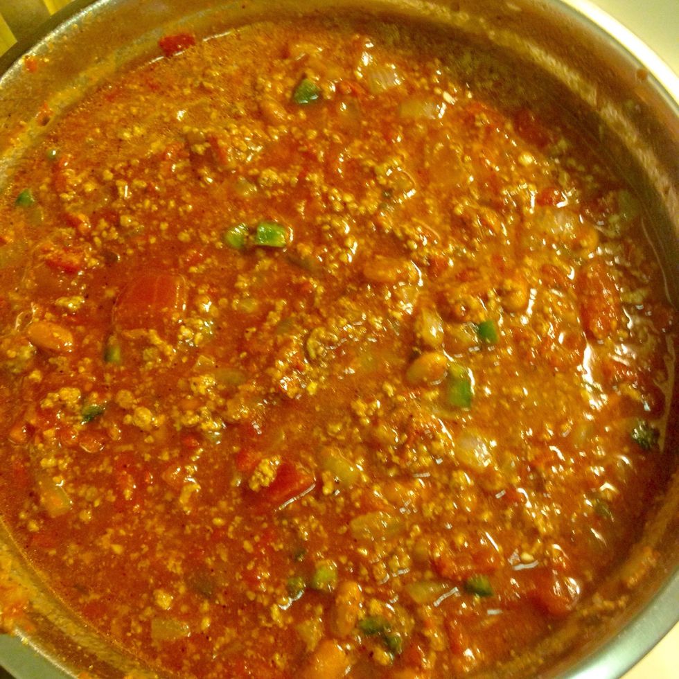 Add all of your remaining ingredients. Bring to a boil, then reduce to a simmer.