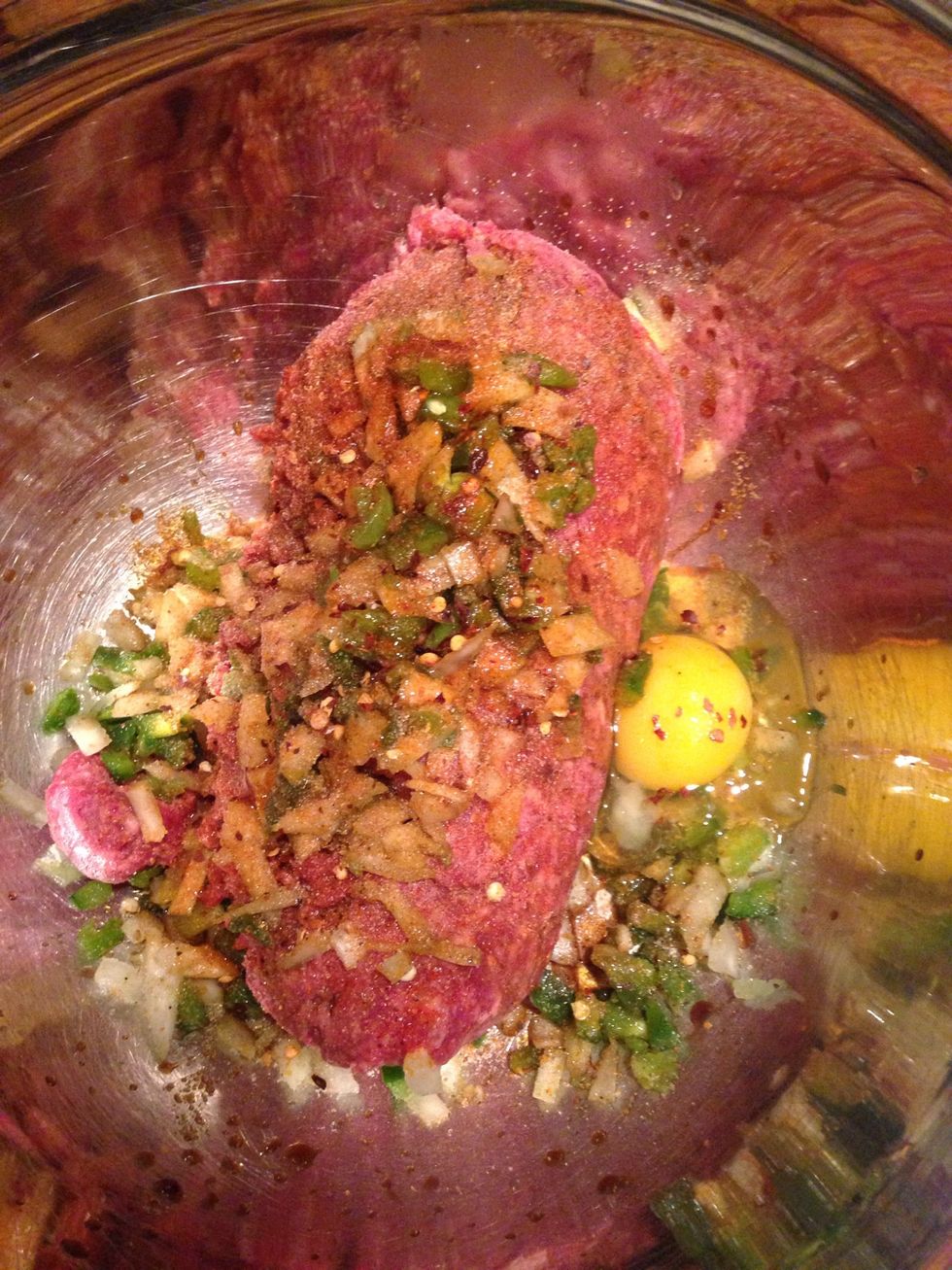 Add all seasonings wet and dry including one egg . You can use bread crumbs if u have them ... I don't