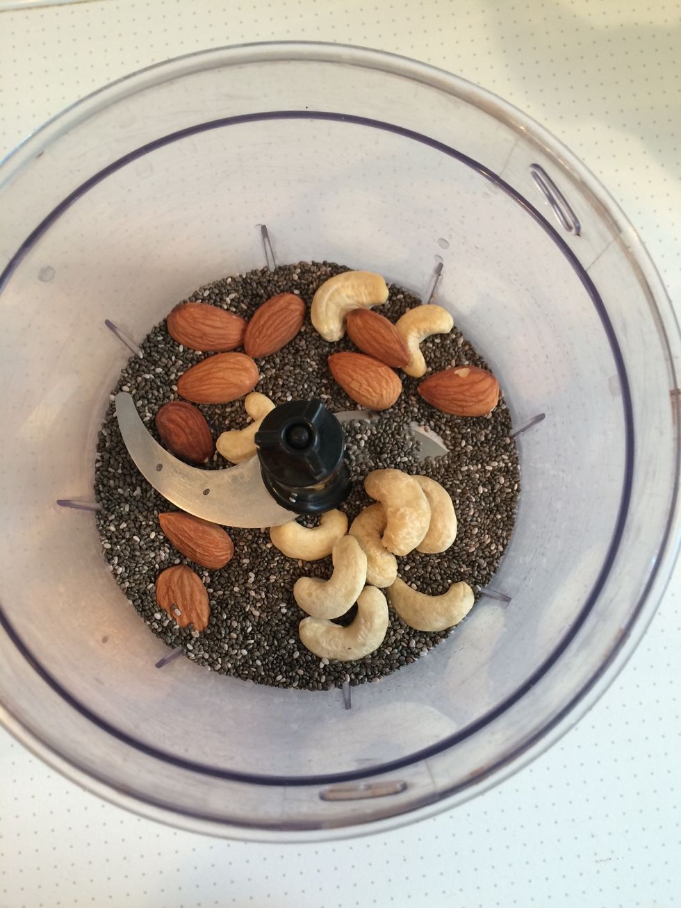 Add all the ingredients - make sure you add the almond milk last