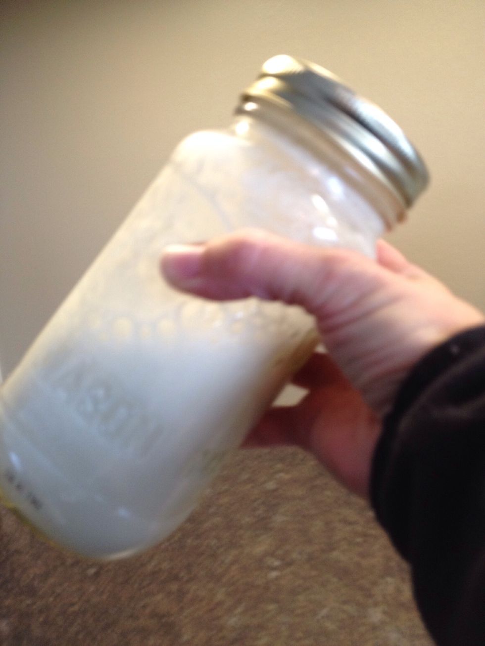 Add all the ingredients to a jar and shake vigorously.