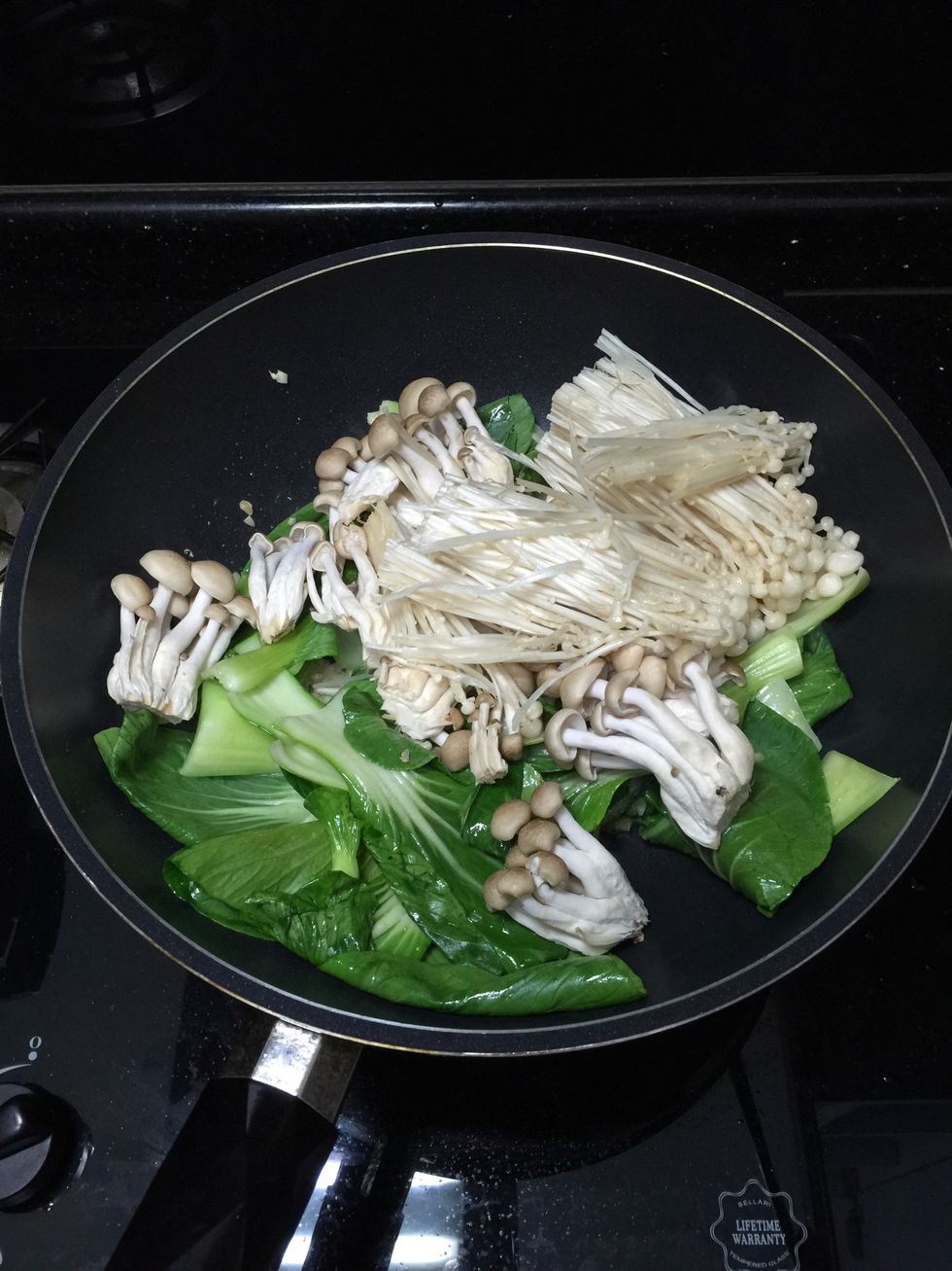 Add all the mushroom and stir fry for another minute.