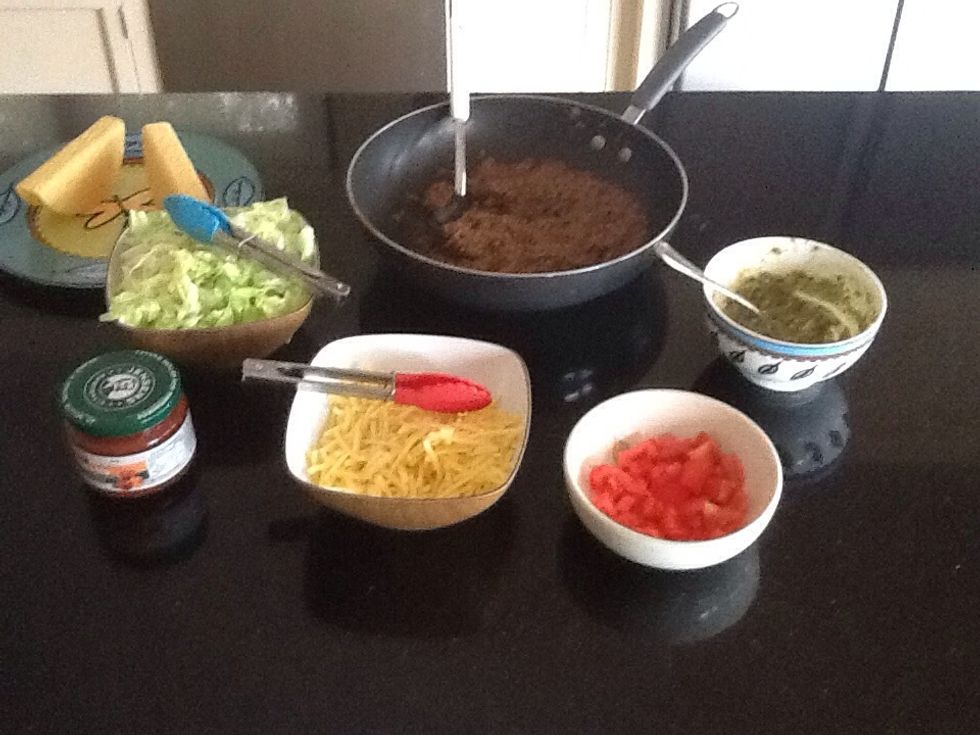 Add all the steps to the table and enjoy eating tacos. Everyone can help themselves and add what they want. It is a fun way of eating lunch or dinner.