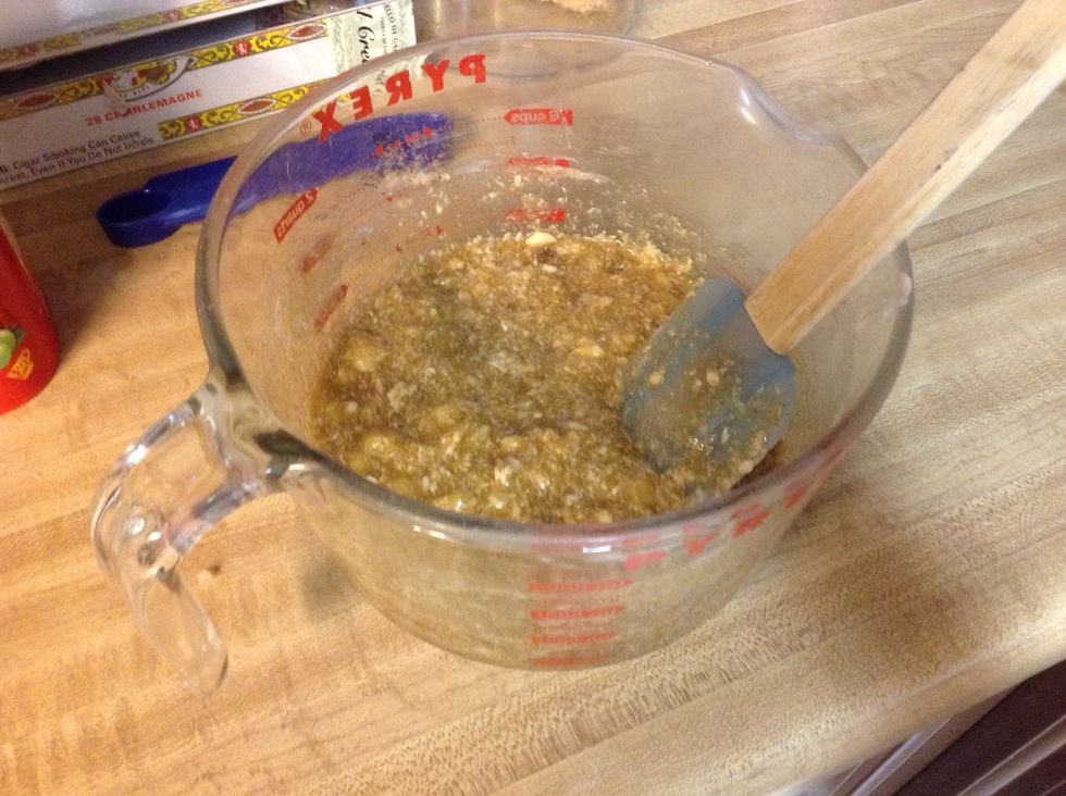 Add all wet ingredients. Butter, brown sugar, nutmeg, cinnamon, egg, and bananas. Then mix together.