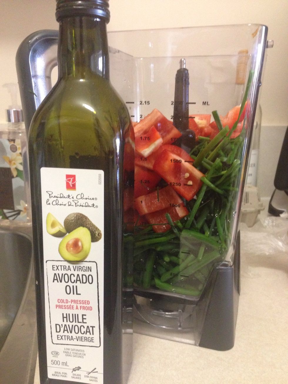 Add all your chopped ingredients into your blender and add extra virgin avocado oil.