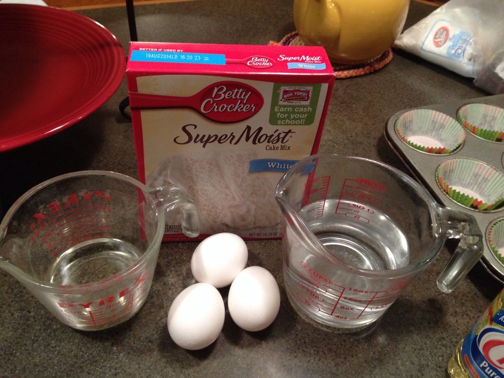 Add all your ingredients up-1/3 cup of vegetable oil, 1 1/2 cup of water, three egg whites, and Betty Crocker box mix.