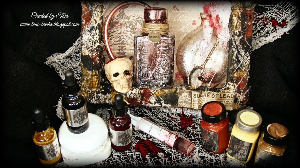 Add all your little details such as skull with tube and rubber mouse, and now you have a new addition to your Halloween decor. Hope this has inspired you to try something a little bit different.