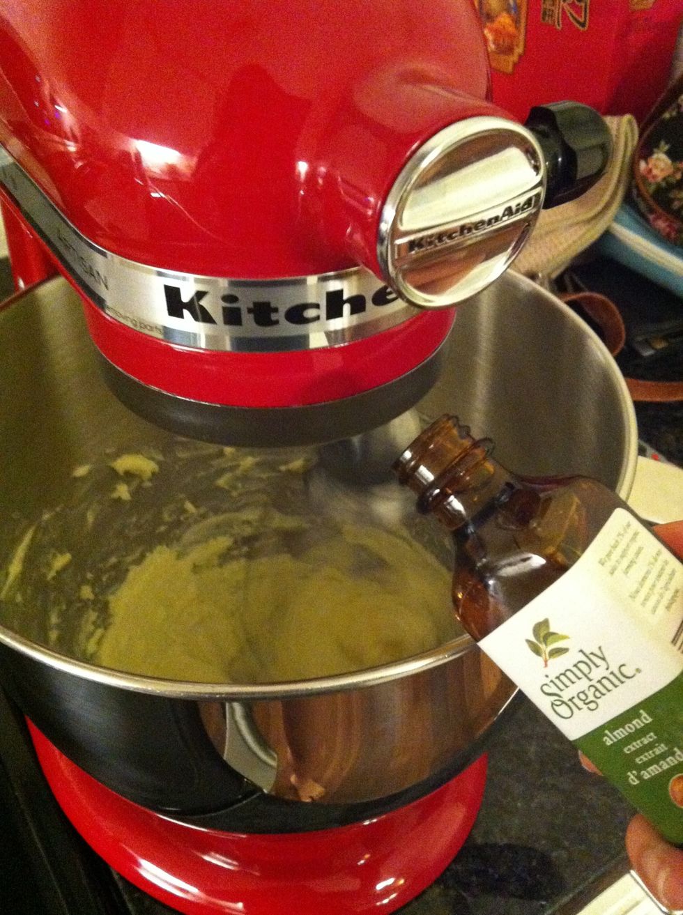 Add almond extract and eggs, beating well after each one