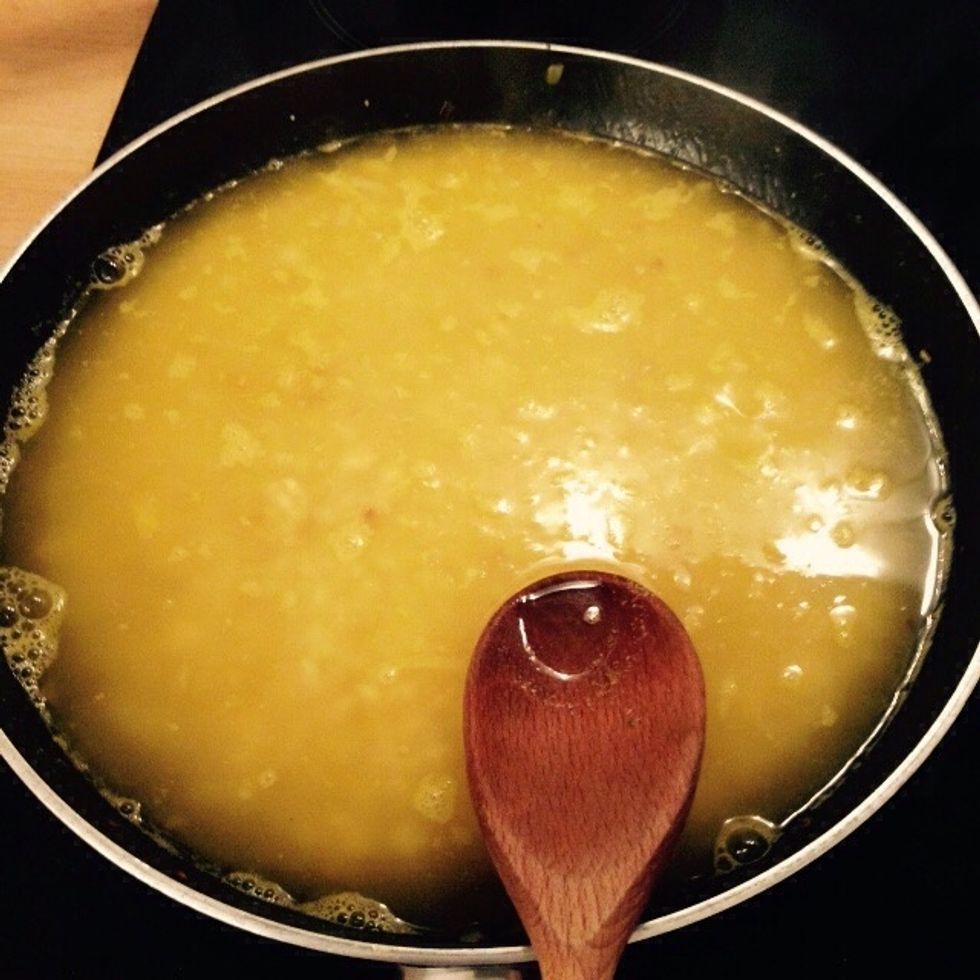 Add also the stock and bring to boil again. Keep adding stock until the rice is almost cooked. Adjust salt and pepper to taste.