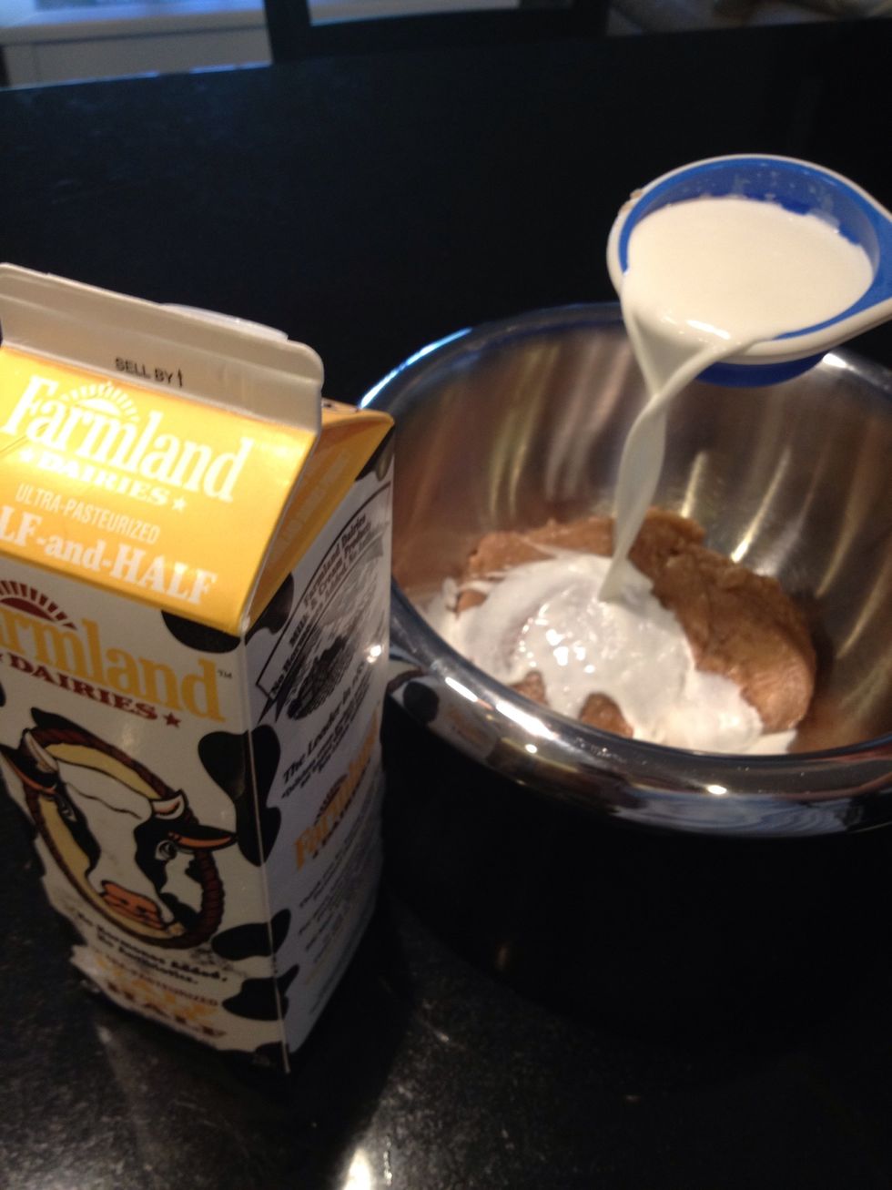 Add an equal amount of half and half or heavy cream. Thicker creams make thicker ice cream.