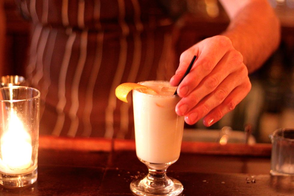 Add an orange twist and a straw.