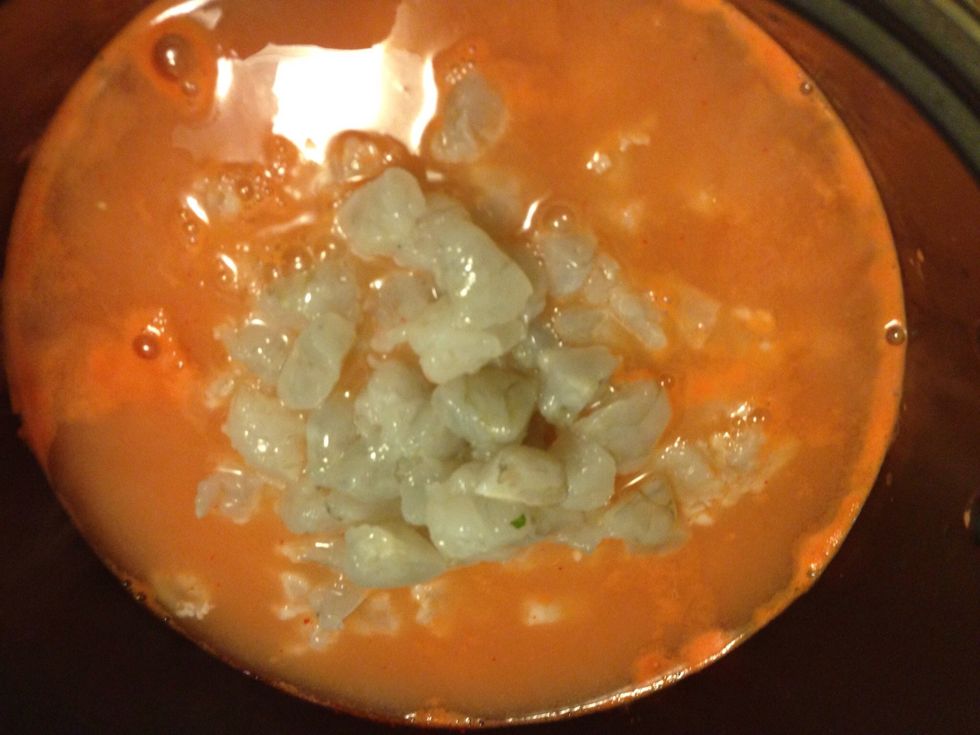 Add and fully cook the shrimp in the shrimp stock