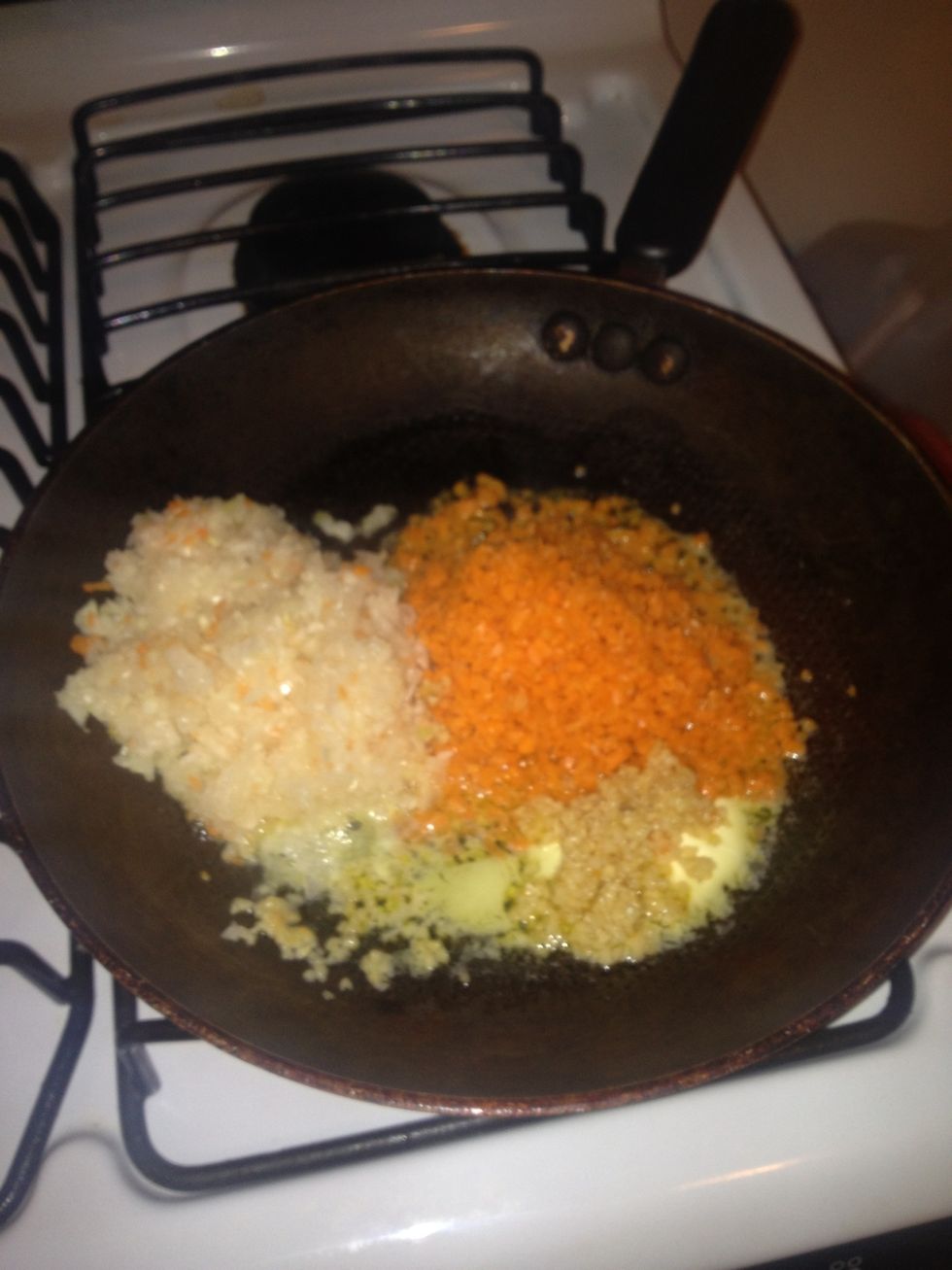 Add and mix carrots, garlic, and onions. Cover and cook until carrots are tender