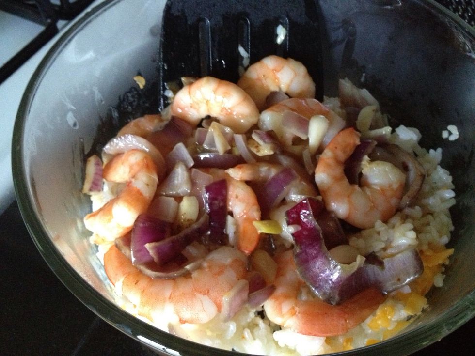 Add and mix well the shrimps and onion.