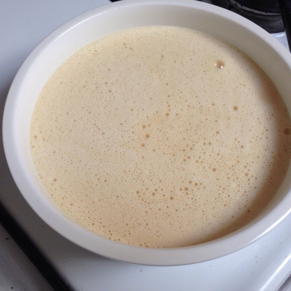 Add and spread the caramelized sugar to bottom of bake pan, should just cover it with 1/2 centimeter depth. After, pour contents of bowl to bake pan.