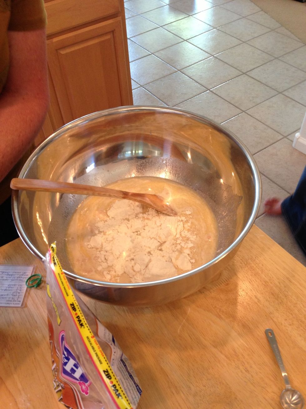 Add and stir in one at a time sugar, melted butter, salt, beat eggs, & 10 cups of flour