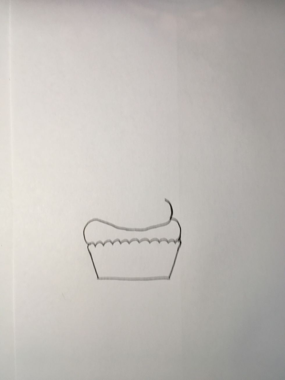 Add another C to connect to the curved line to the cupcake liner.