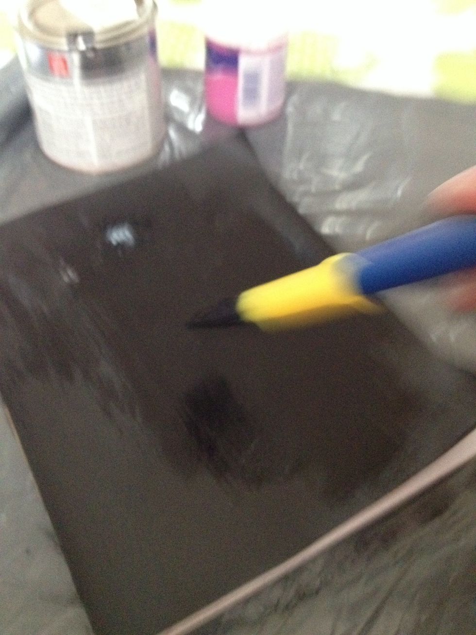 Add another coat of paint once it's fully dried it's ready to use, if the edges are turned upwards, put a heavy book on top and it'll straighten out