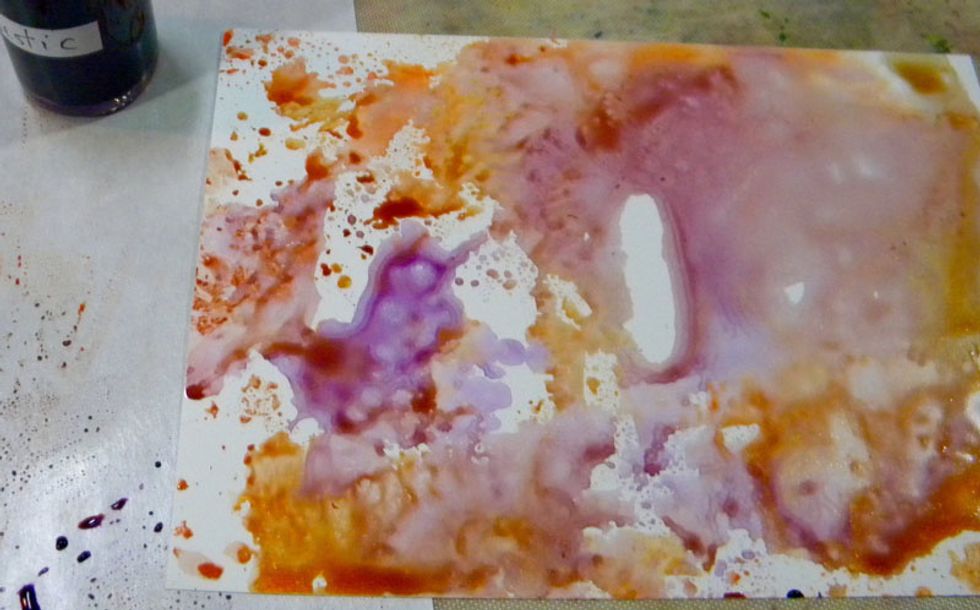 Add another color, Majestic (purple) to what is left on the mat and swipe on a new piece of Yupo. This technique creates really interesting effects.