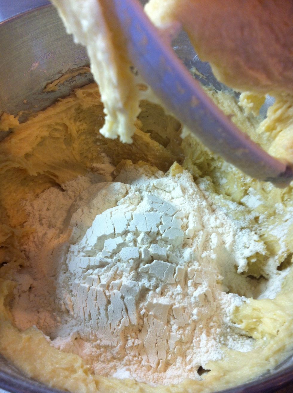 Add another cup (4 cups bread flour total) and mix gently in. You may need more flour; I didn't this particular morning. You will knead the bread and use more flour then; keep that in mind