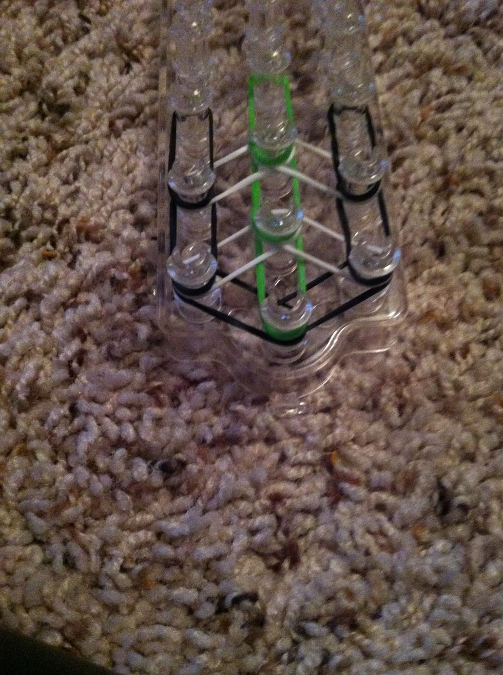 Add another green in the middle row.