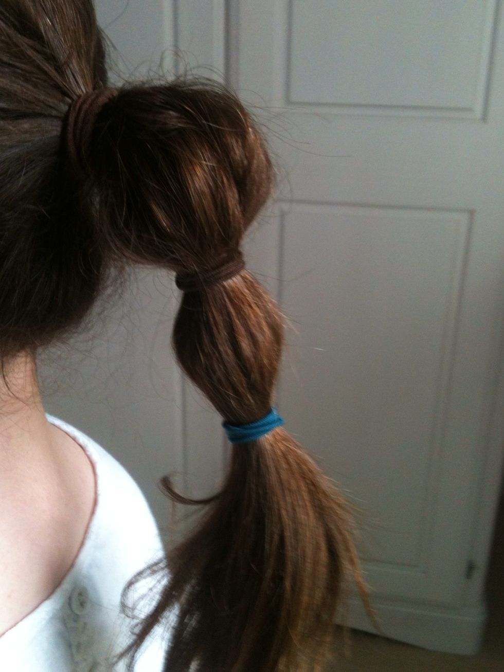 Add another hair tie and repeat.