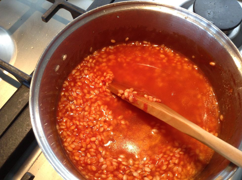 Add another ladle of chicken stock and reduce.
