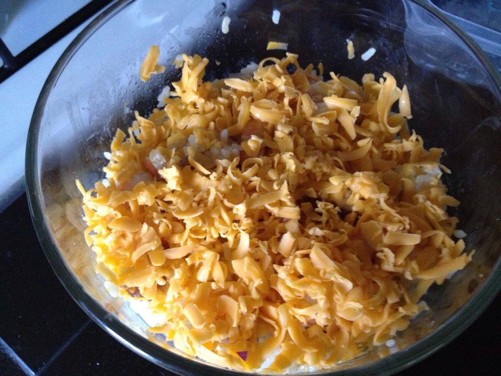 Add another layer of cheese to cover all the ingredient in the bottom.