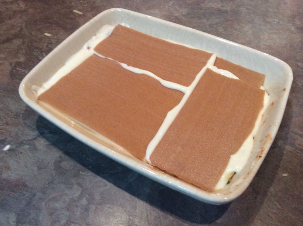 Add another layer of lasagna sheets.