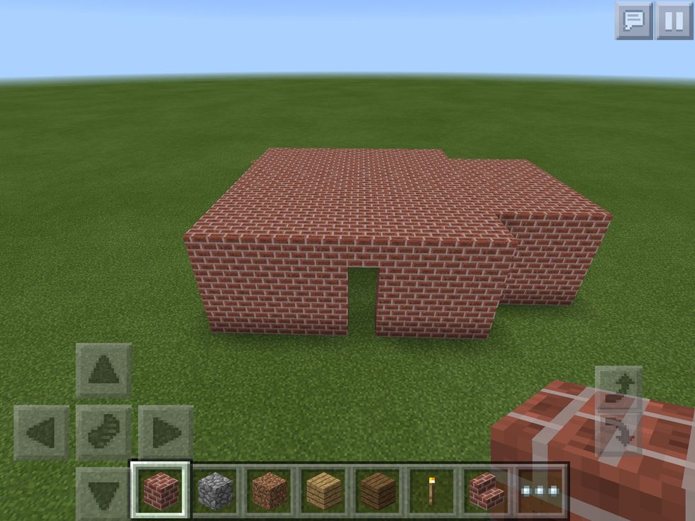 Add another layer. When you are happy, make the roof by putting blocks across the structure.