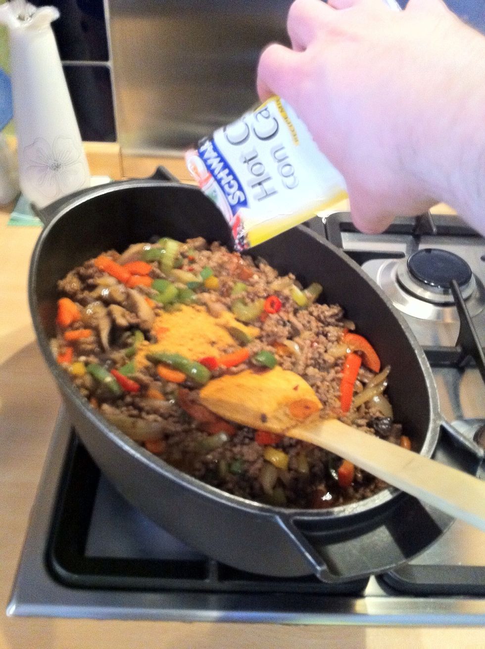 Add another packet of hot chilli mix and stir thoroughly.