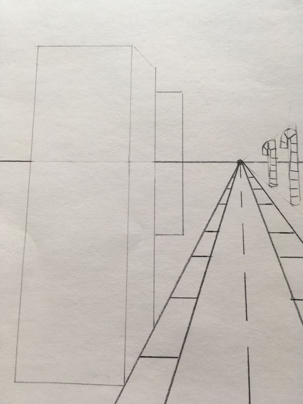 Add another rectangle.  Do not let it touch the sidewalk.