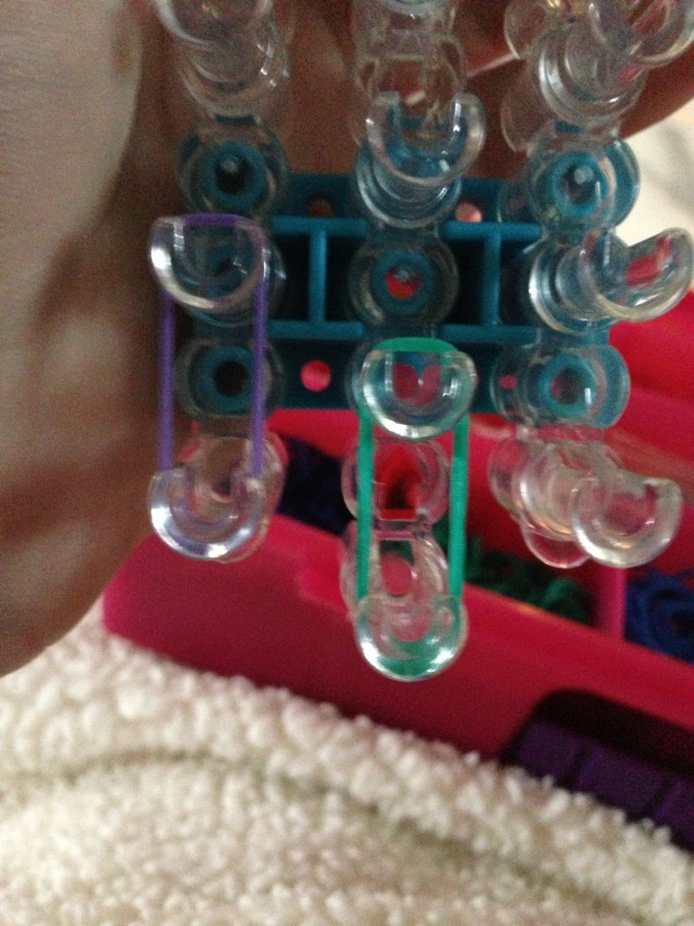 Add another rubber band on the middle two pegs\ud83d\ude1c