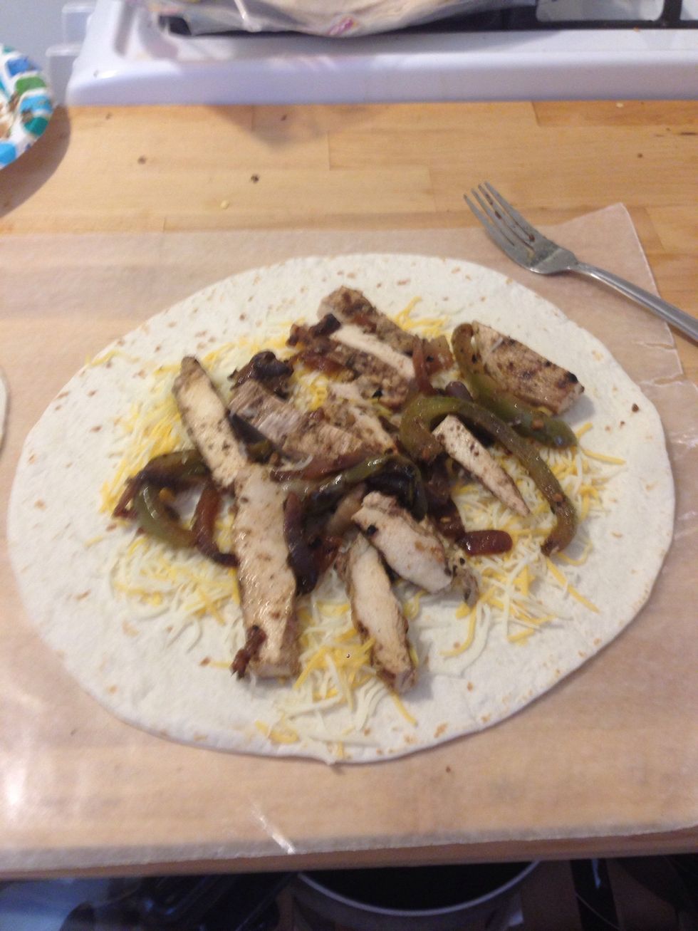 Add any leftover meat/veggies that go together. I had fajita chicken, grilled onions, and peppers.