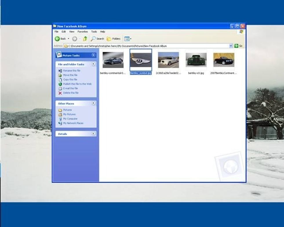 Add any photos you want to include in your Facebook album to your newly created folder