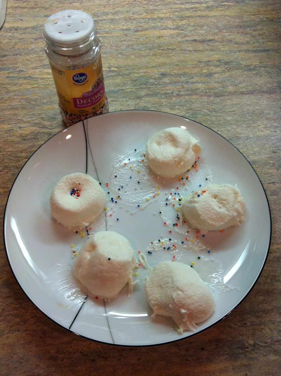 Add anything you want on top for decoration (like food coloring). I don't have any food coloring so I used sprinkles instead