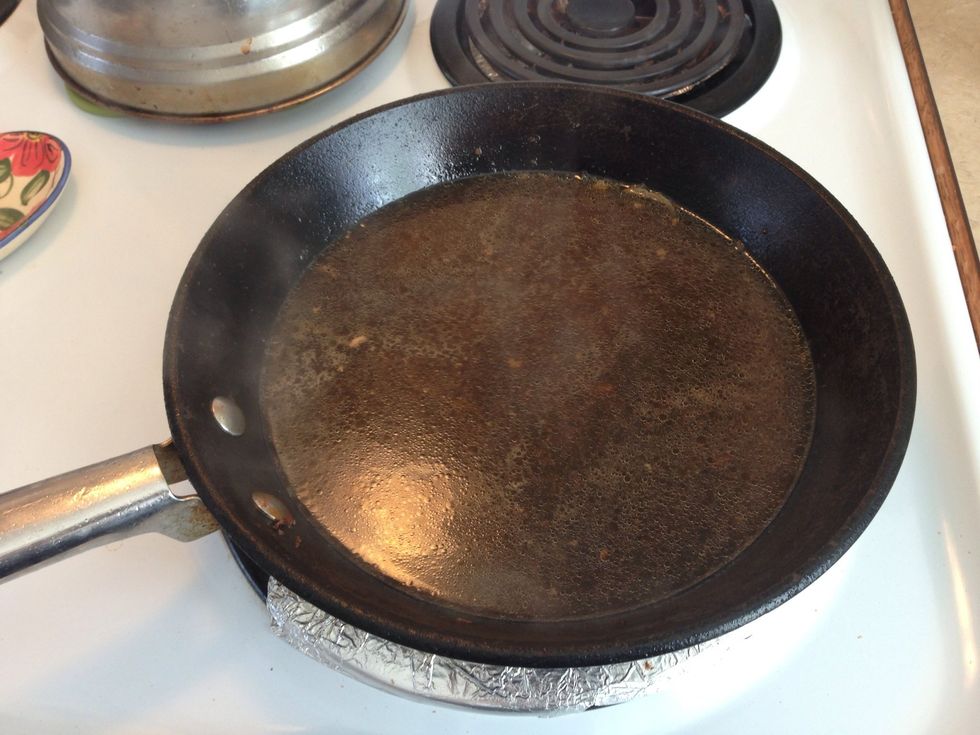 Add apple juice to pan, cooking on med-low heat. Scrape up brown bits with a wooden spoon.