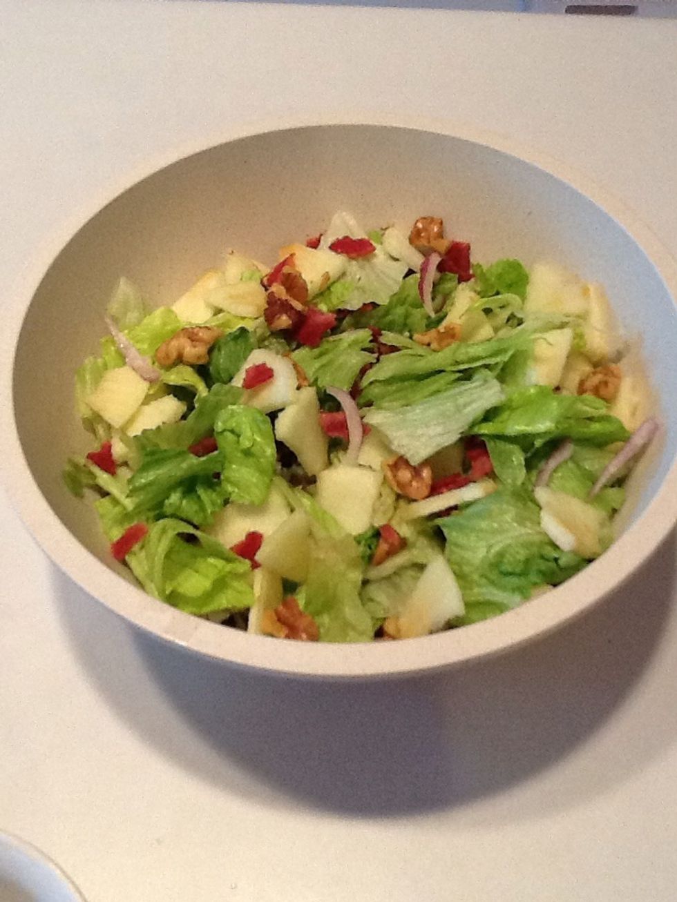 Add apples to salad.