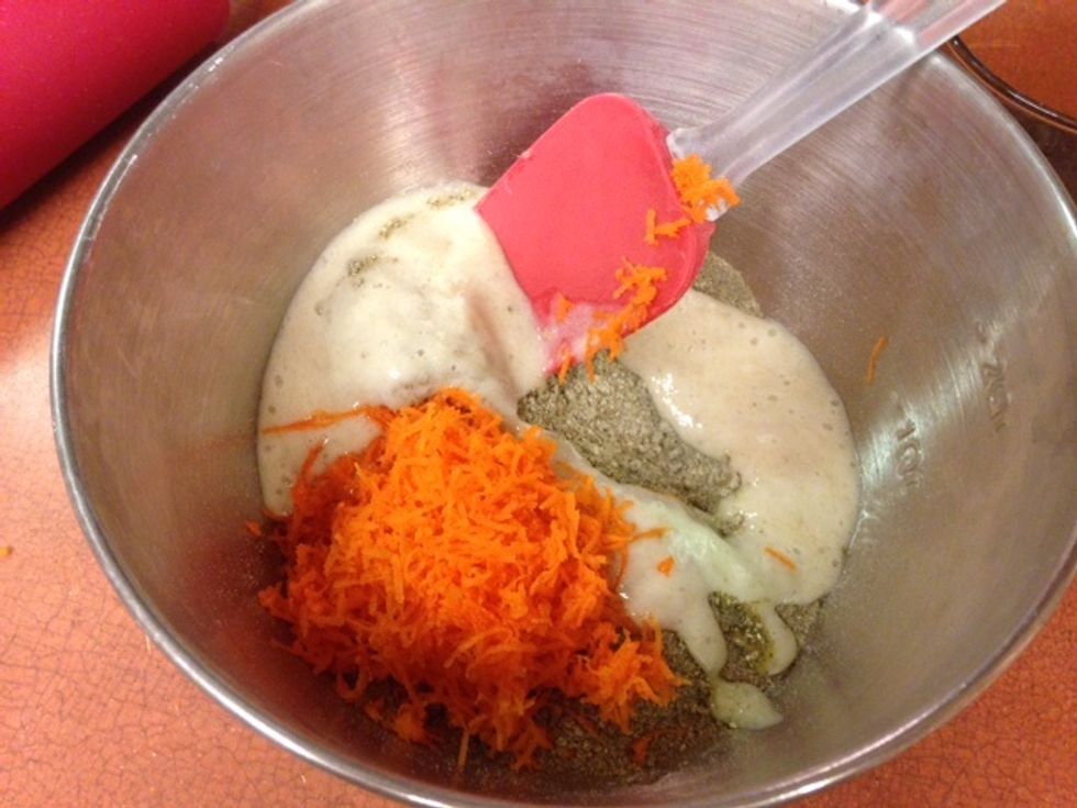 Add applesauce to the bowl and mix all ingredients thoroughly. Add water 2 tablespoons at a time, mixing after each addition. The dough should be moist and hold together like stiff cookie dough.