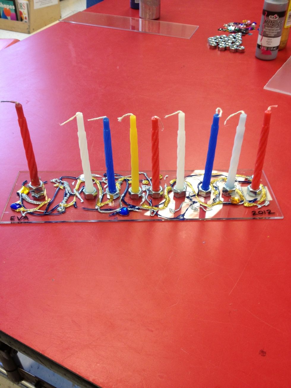 Add appropriate candles each night.