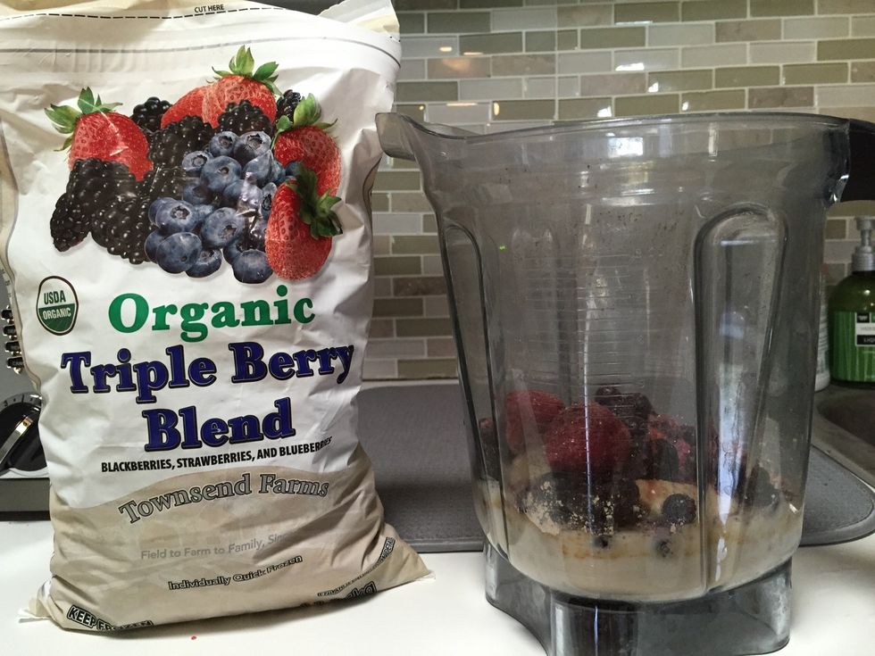 Add approximately half a cup of frozen berries. I like this mix of organic berries from Costco.