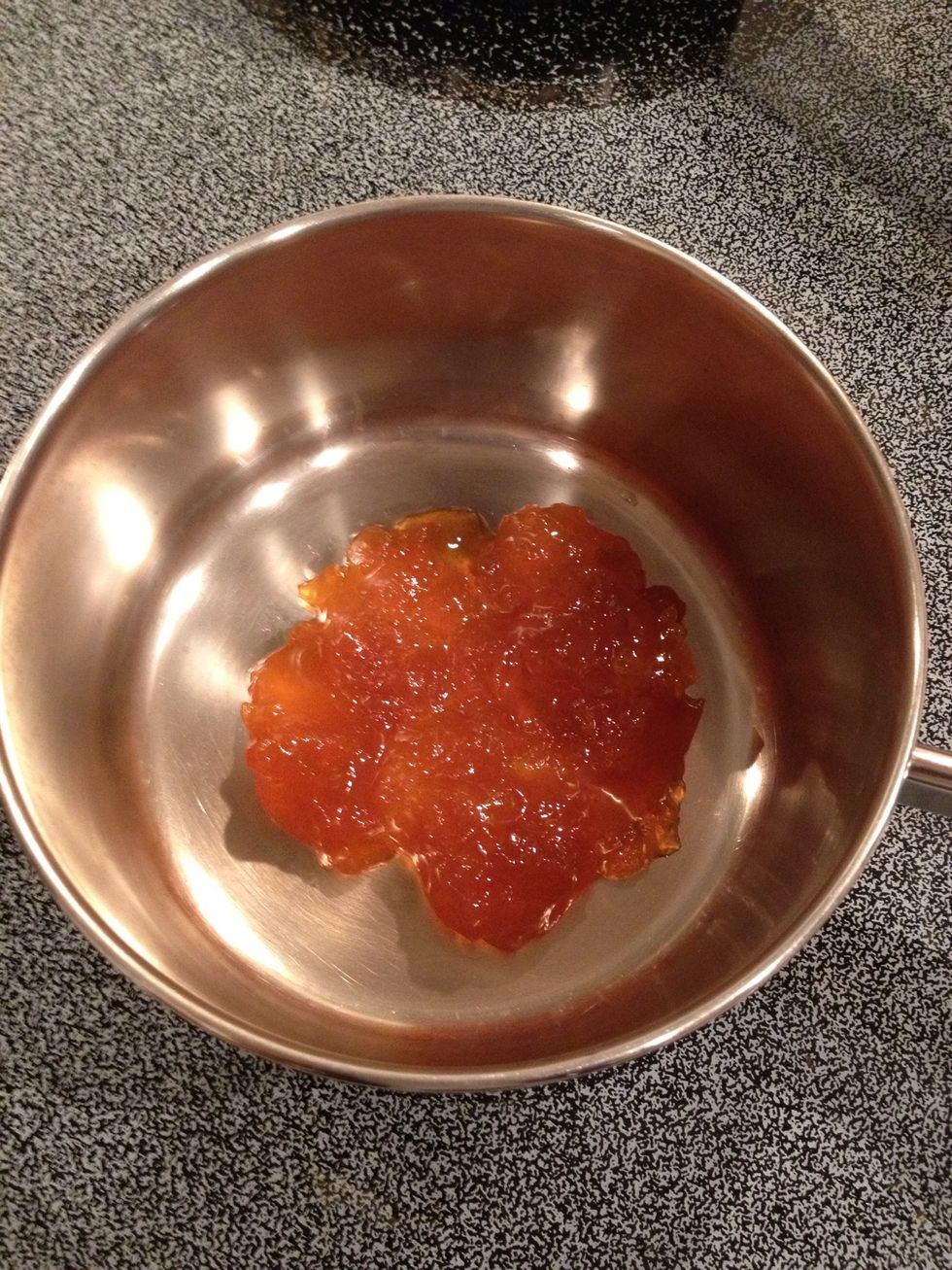Add apricot preserves to a small saucepan.
