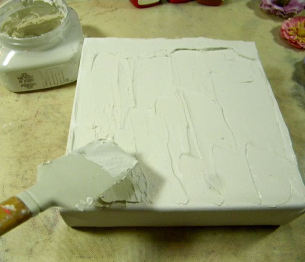 Add Art Anthology Mud to the canvas in a thick layer.  It doesn't have to be smooth.