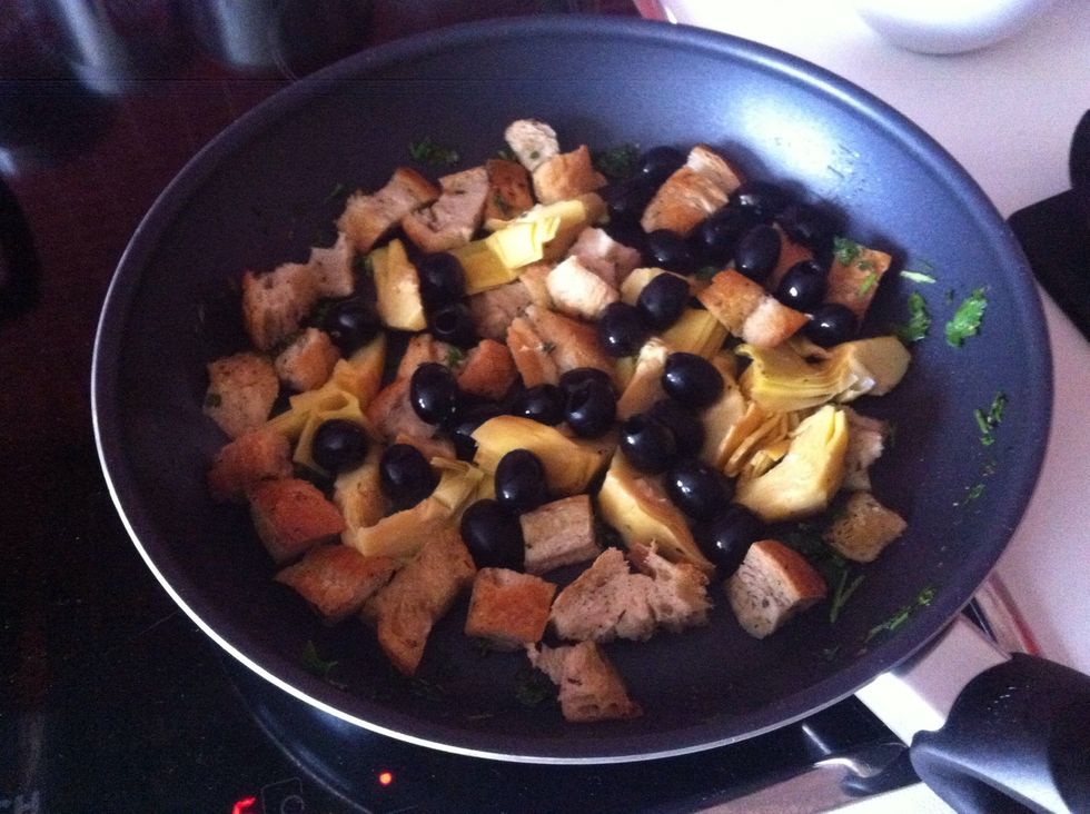 Add artichoke, olives, chili and Provence herbs. Fry for a few more minutes. (Keep mixing)