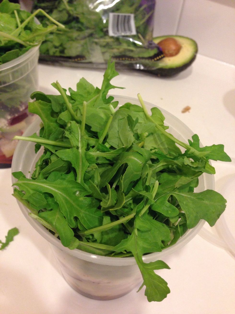 Add arugula (or any greens). You can really stuff it in there if you want. It's hard to shake the container (and mix the dressing with the salad) if it is very stuffed. You can also add chicken/nuts.