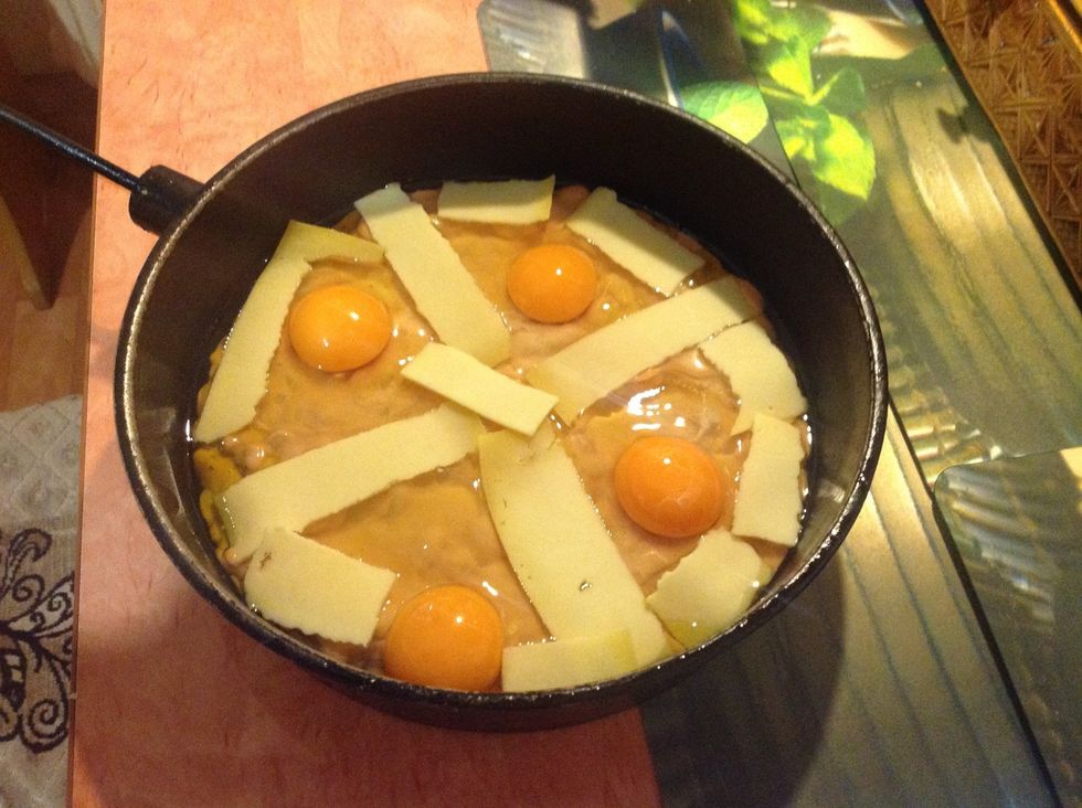 Add as much cheese as you wish. And put everything into the oven for 20 min.