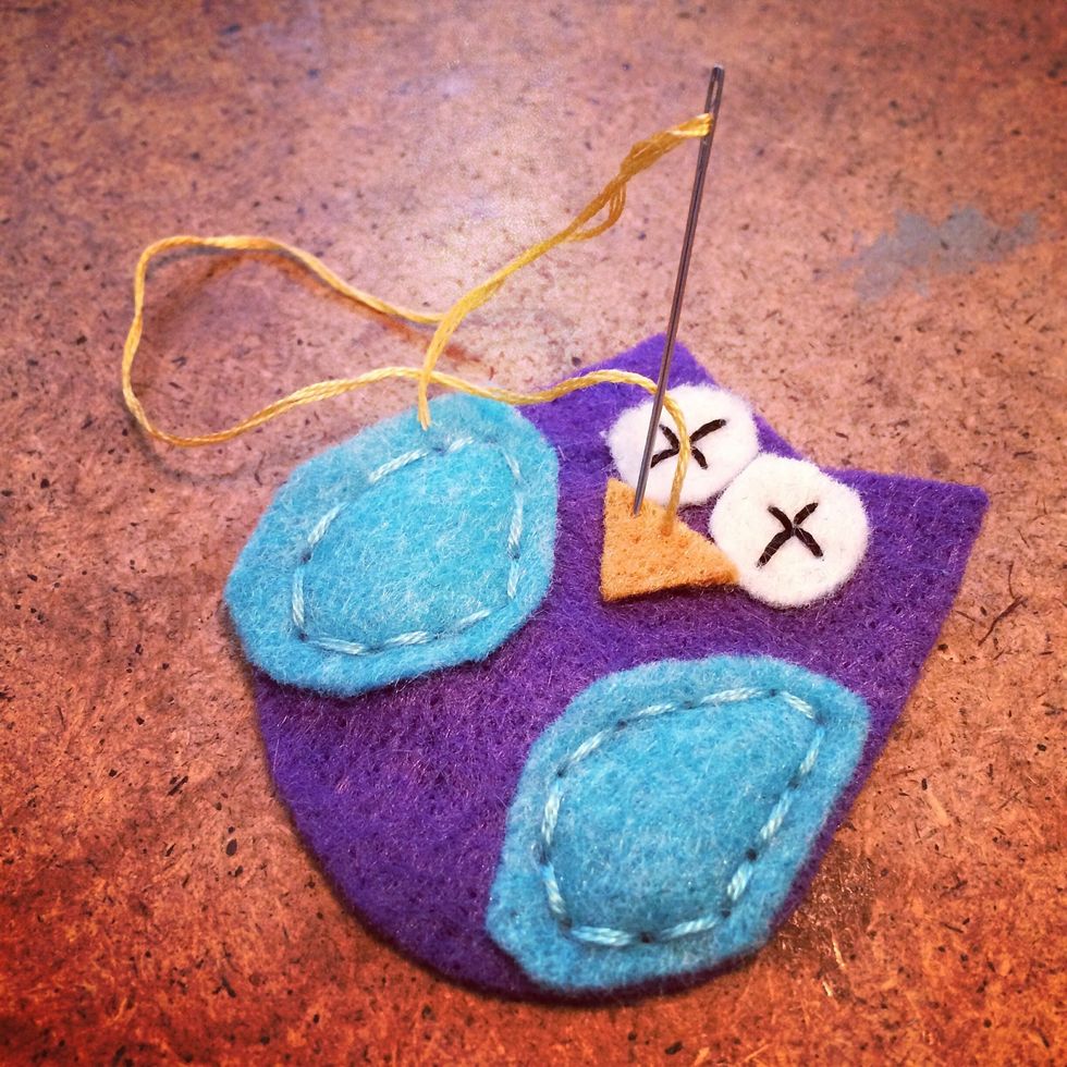 Add as much or as little detail as you want. You could also use scrap fabric or maybe buttons.